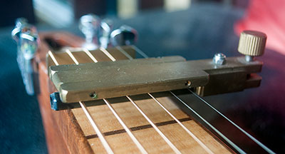 GM capo fitted to guitar